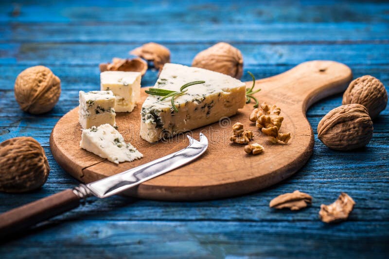 Blue cheese with nuts stock photo. Image of roquefort 62857614