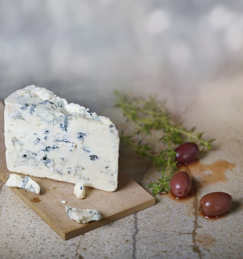 Blue Cheese and Olives stock image. Image of cutting 54125539