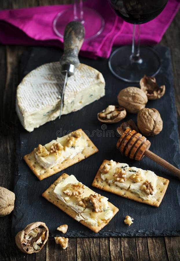 Blue Cheese and Walnut Crackers with Honey. Stock Photo Image of blue