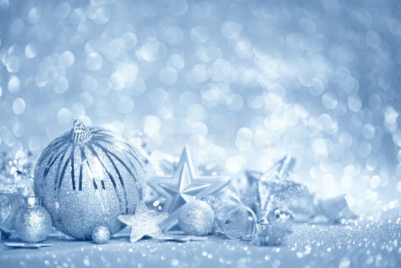 Scintillanti ornamenti di Natale blu di sfondo.