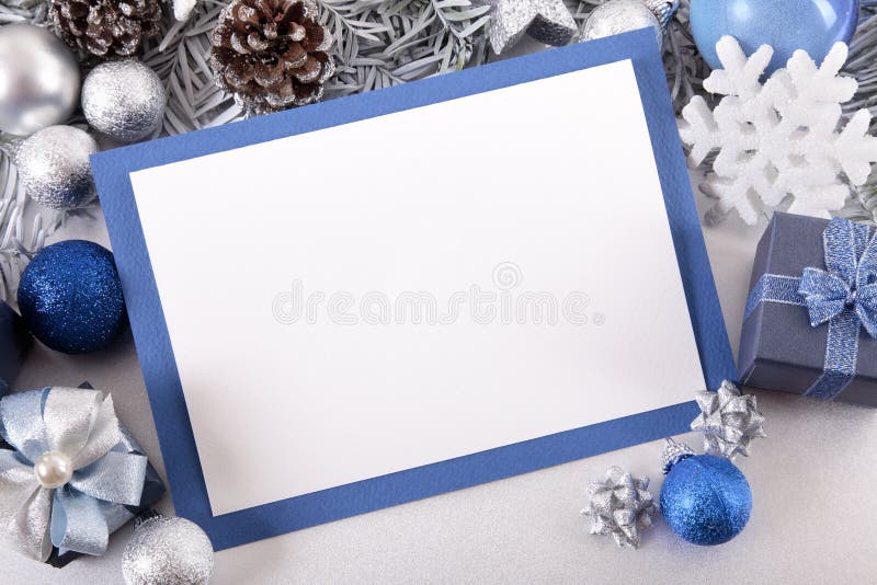 Blue Christmas card background with decorations and copy space