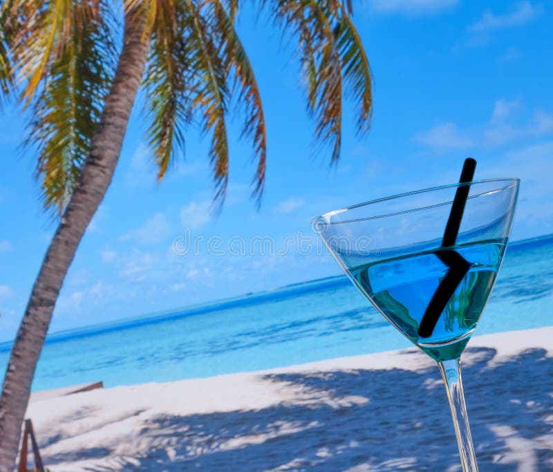 Blue cocktail on beach stock photo. Image of colada, milk - 41815458