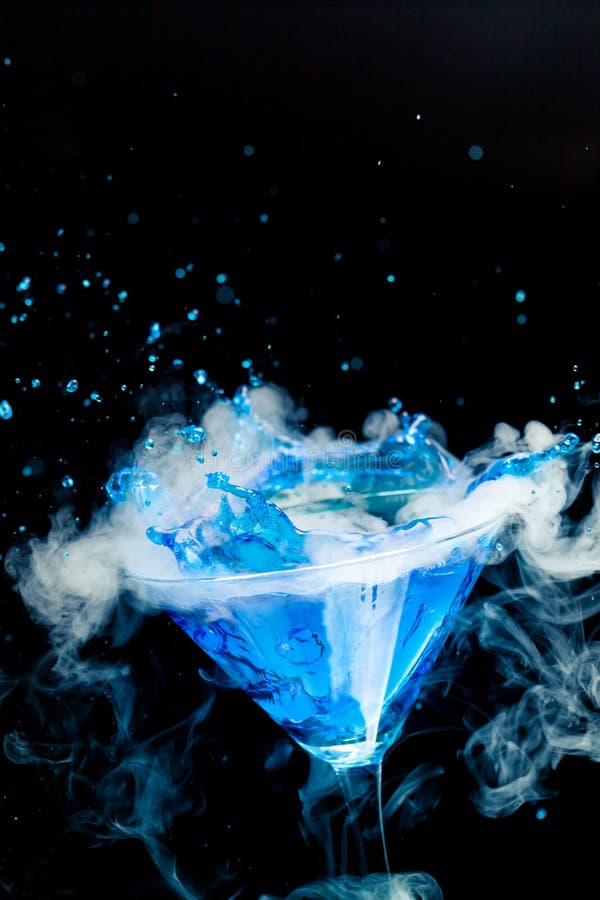 Blue cocktail with splash stock photo. Image of abstract - 34511420