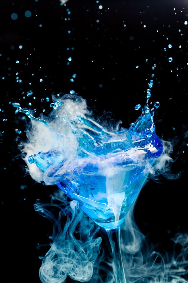 Blue cocktail with splash stock photo. Image of abstract - 34511420