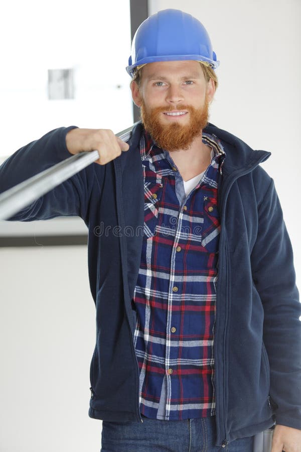 Bluecollar Worker W Carrying Heavy Metallic Bar Stock Image Image of