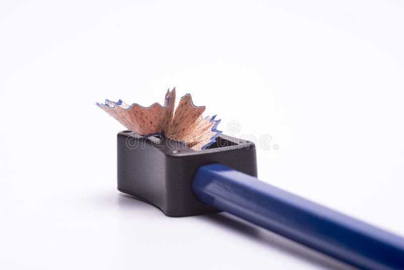 Blue coloured pencil sharpened using a sharpener royalty free stock photos Blue coloured pencil sharpened using a sharpener royalty free stock photos