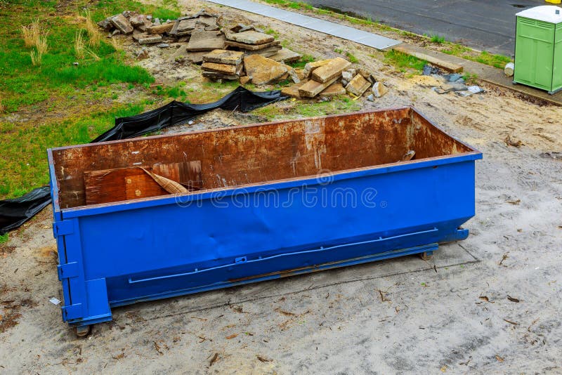 Blue Metal Waste Container With Building Debris, Industrial