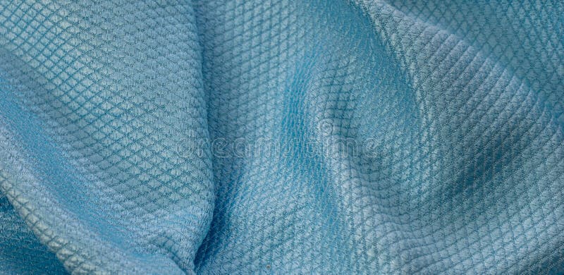 Blue cotton fabric with an interesting pattern stock image