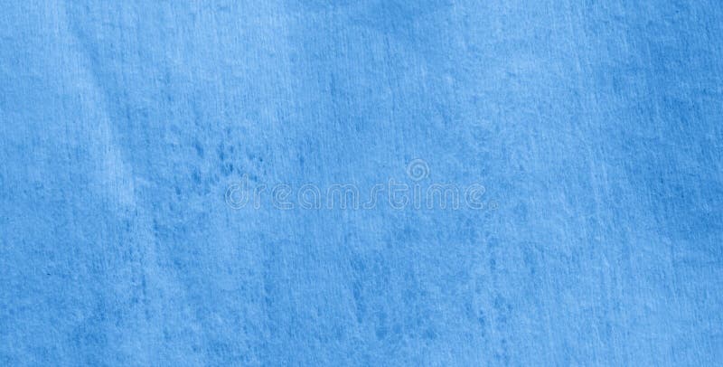 Blue cotton fabric with a visible texture royalty free stock photos