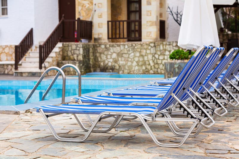 Blue Deck Chairs at the Swimming Pool Stock Photo Image of chairs