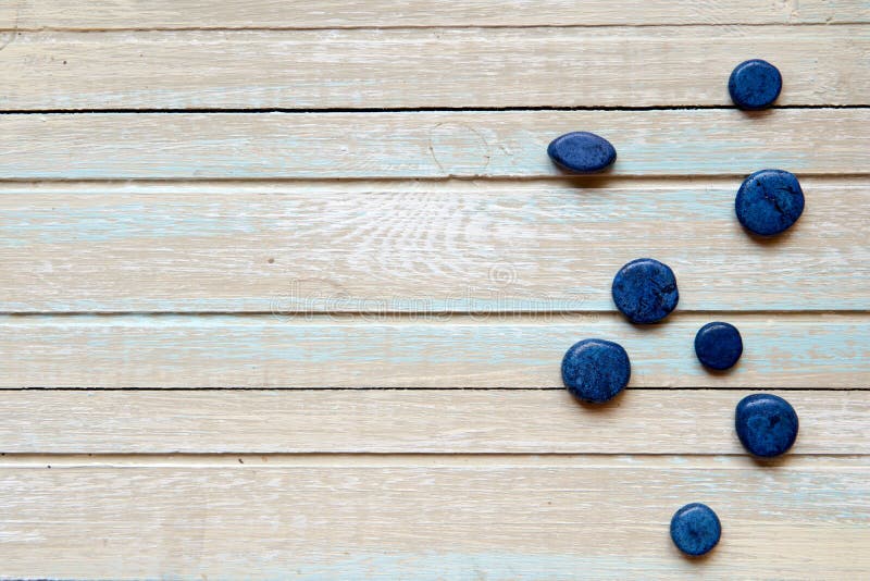 Blue Decorative Stones on a Wooden Background Stock Image Image of