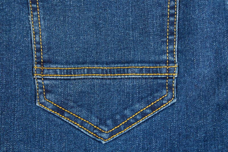 Blue denim fabric with distinct stitching on the pocket stock photos