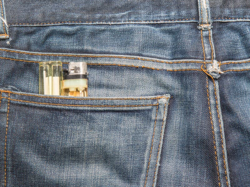 Blue Denim Jeans with Cigarette Lighter (focus on Cigarette Lighter ...