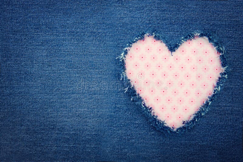 Blue denim jeans with pink heart