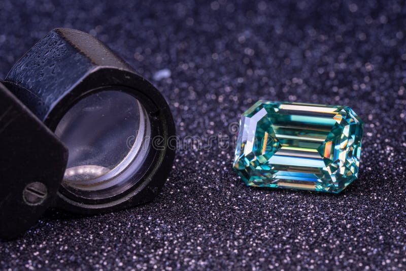 Blue diamond gemstone. Jewelry making background. Emerald cut diamonds.