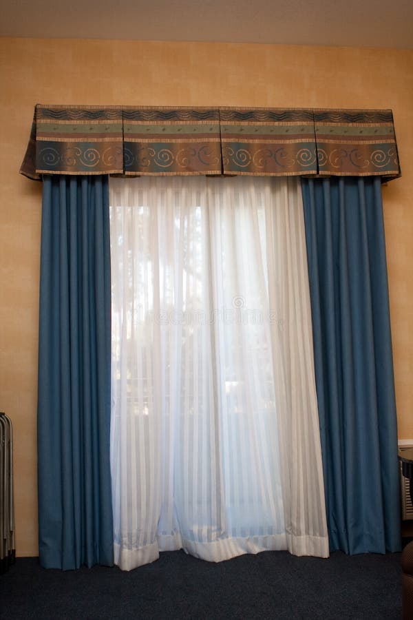 BLue drapes covering window royalty free stock photos BLue drapes covering window royalty free stock photos