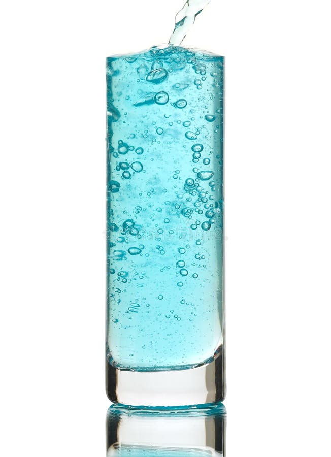 Blue drink being poured into a glass