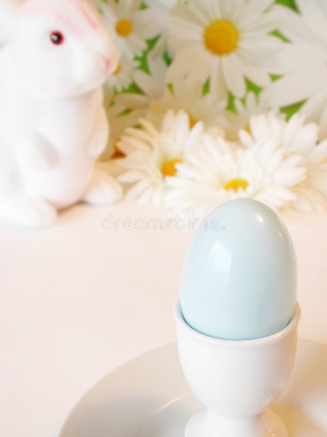 Blue egg in egg cup