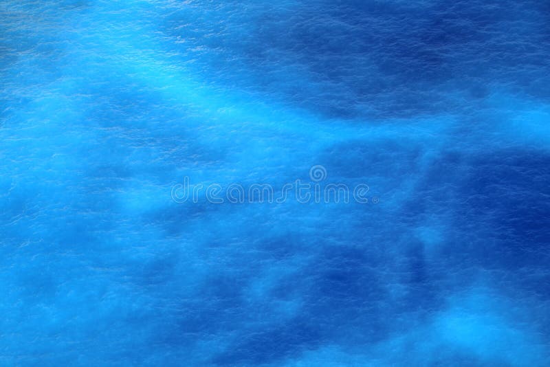 Blue empty sea surface or ocean with waves for a background stock photo Blue empty sea surface or ocean with waves for a background stock photo