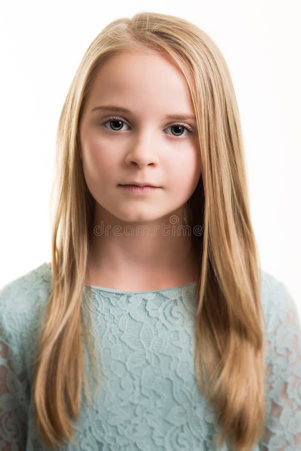 Blue Eyed Young Girl In Turquoise Top Isolated Sto