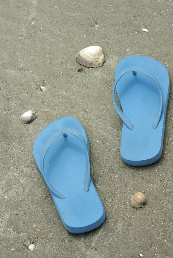 Blue flip flops on beach stock image. Image of shoes - 14269671