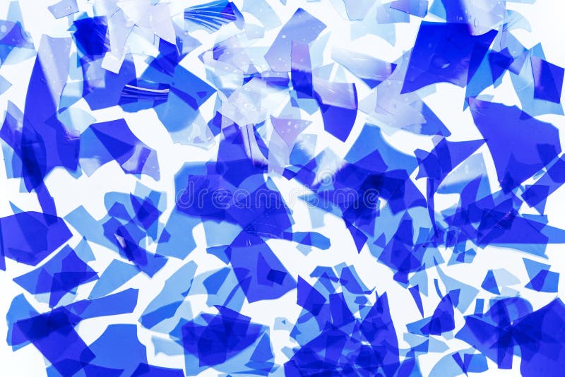 Blue glass confetti. Fragments of very thin colored glass for fusing. Background image, texture vector illustration