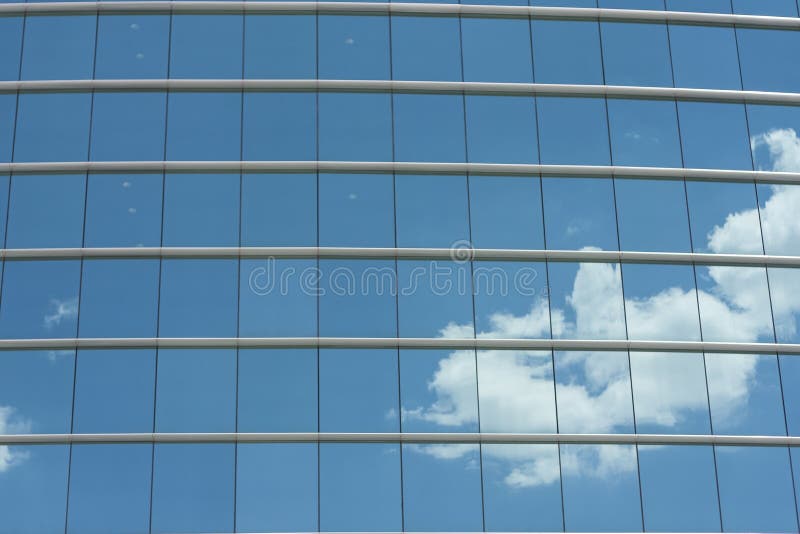 Blue glass wall of office building