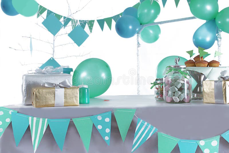 Blue and green colored birthday party table