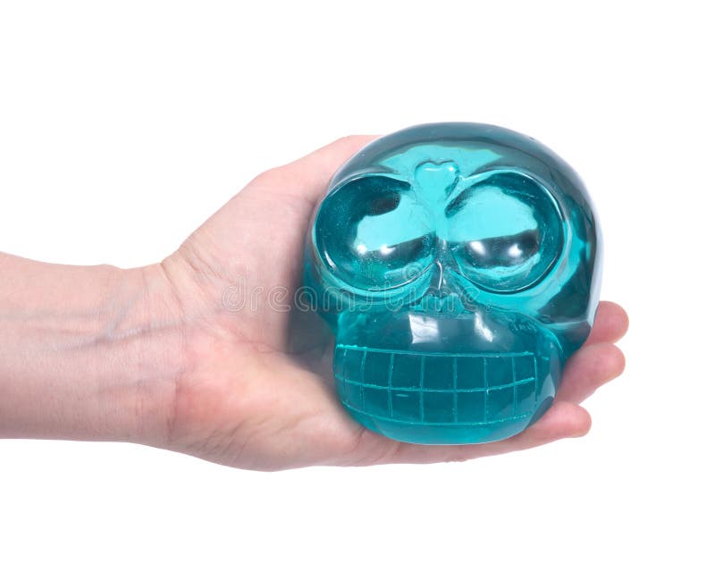 Blue green obsidian skull stock photography