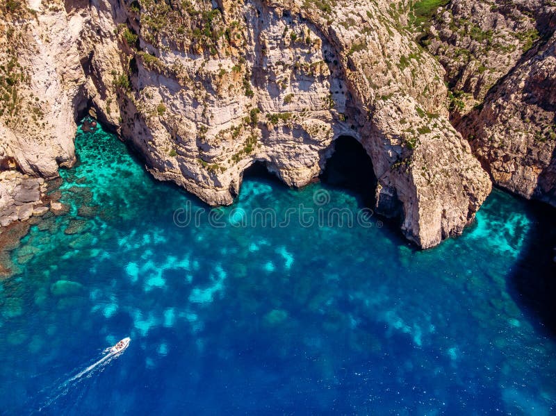 Blue Grotto in Malta. Aerial top view from Mediterranean Sea.