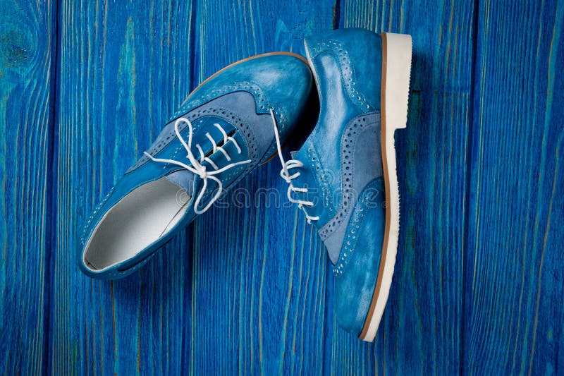 Blue Imitation Leather Shoes Laced with White Laces. Close-up Shot ...