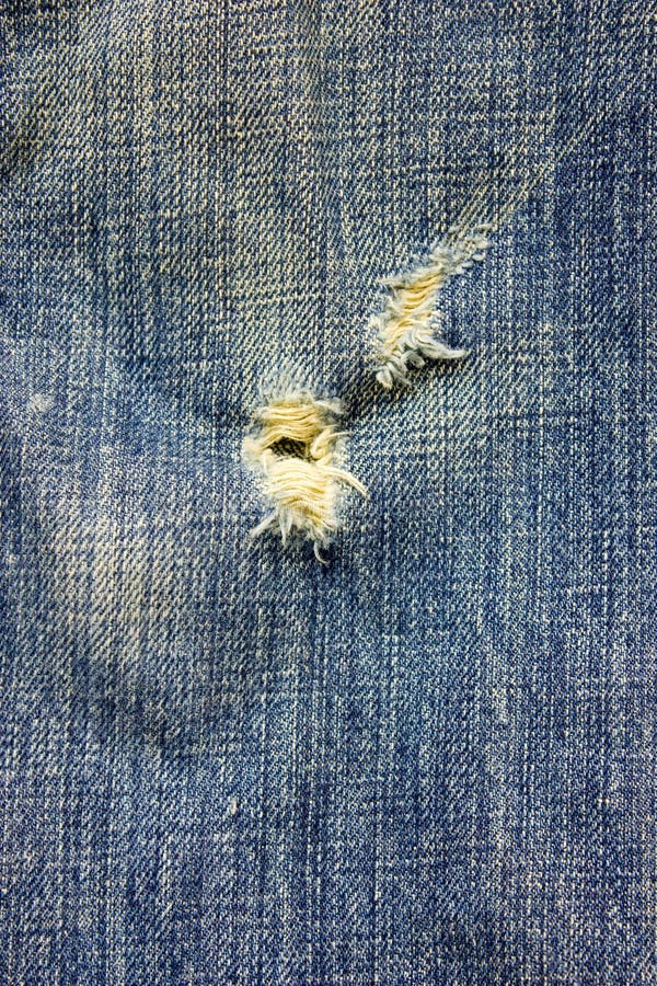 Frayed and torn old jeans stock image. Image of color - 4491903