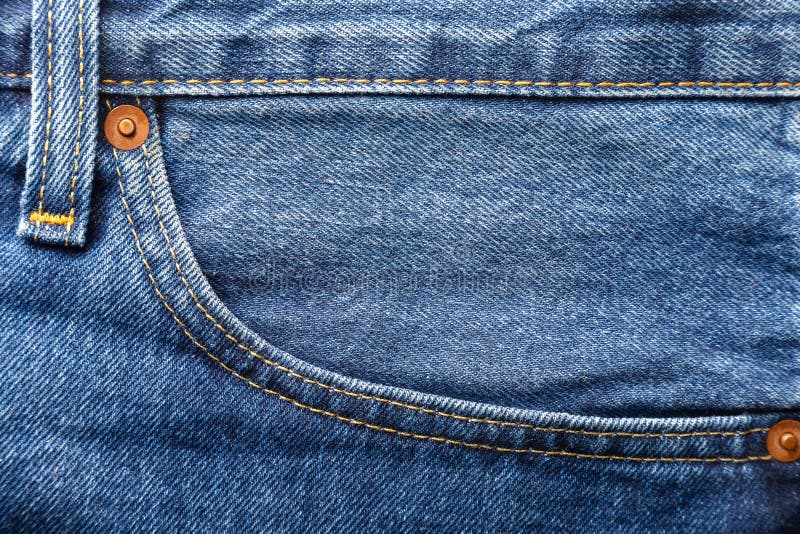 Blue Jeans with Front Pocket and Seams Close Up View. Top Macro View