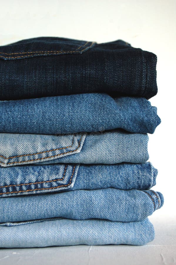 Stack of five blue jeans stock image. Image of pants, outfit - 4634249