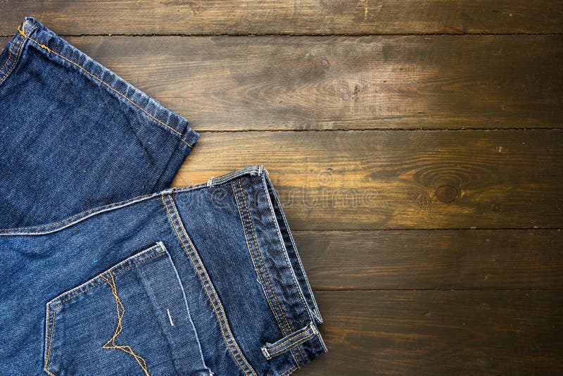Blue Jeans on Wooden Background Stock Image - Image of wood, retro ...