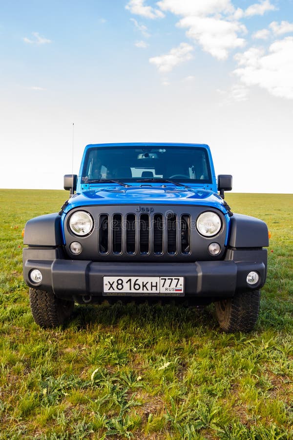 Blue Jeep Wrangler Rubicon Unlimited in Wild Tulip Field Near Saltwater  Reservoir Lake Manych-Gudilo Editorial Image - Image of editorial,  convertible: 87274320