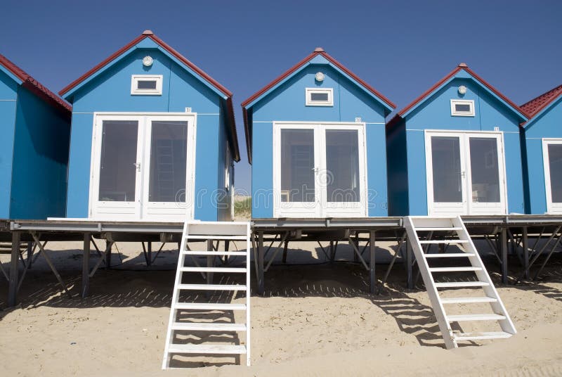Blue little Beachhouses stock photo. Image of cottage 2292894