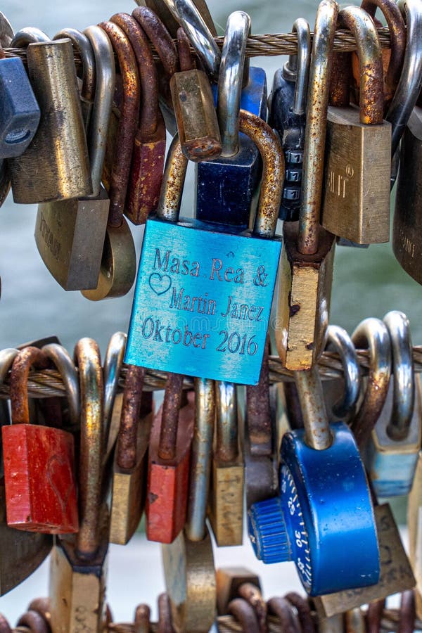 Blue love lock with a love script stock image