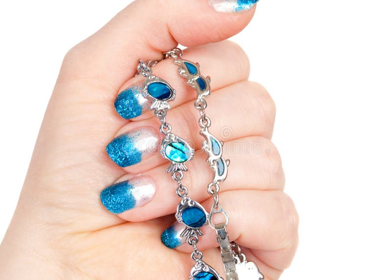 Blue manicure and bracelets