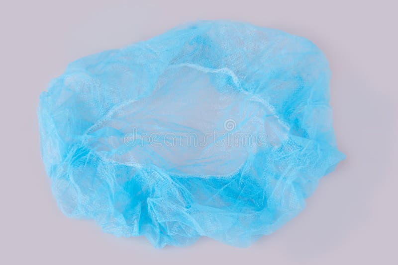 Blue medical disposable cap isolated on white