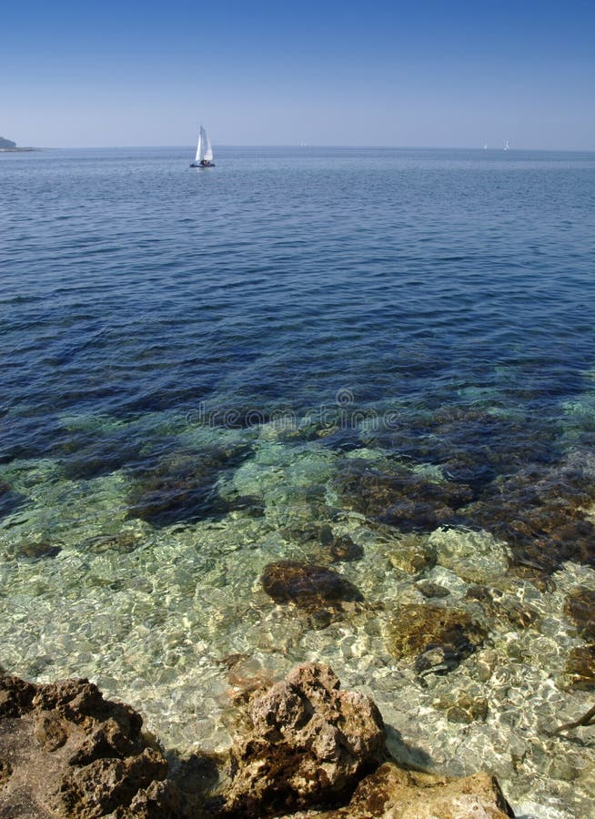 Blue Mediterranean sea stock image. Image of boat, stone - 2379063