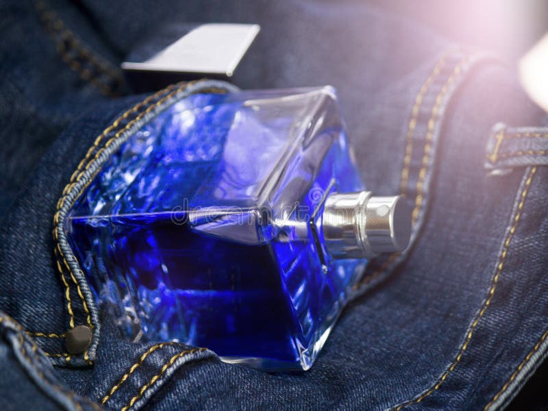 Blue Men`s Perfume and Jeans, Fresh Ocean Fragrance Stock Photo - Image ...