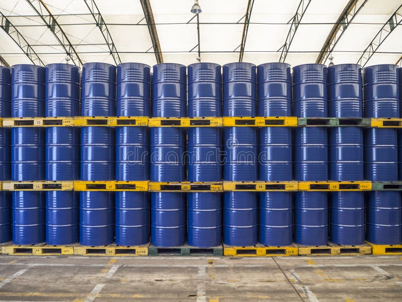 Blue metal barrels stacks in warehouse. capacity is 200 litre for each barrels. Metal steel drum stock images, royalty-free photos and pictures
