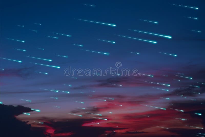 Blue meteors rain on the sunset night sky dark cloud royalty free stock photography