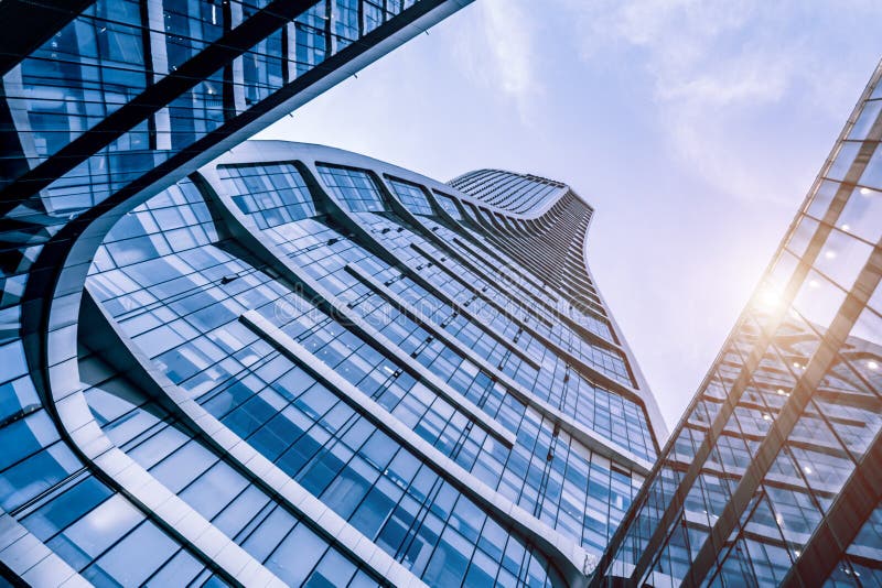 Blue Modern Glass Curtain Wall Architecture Low Angle Up-beat royalty free stock photography