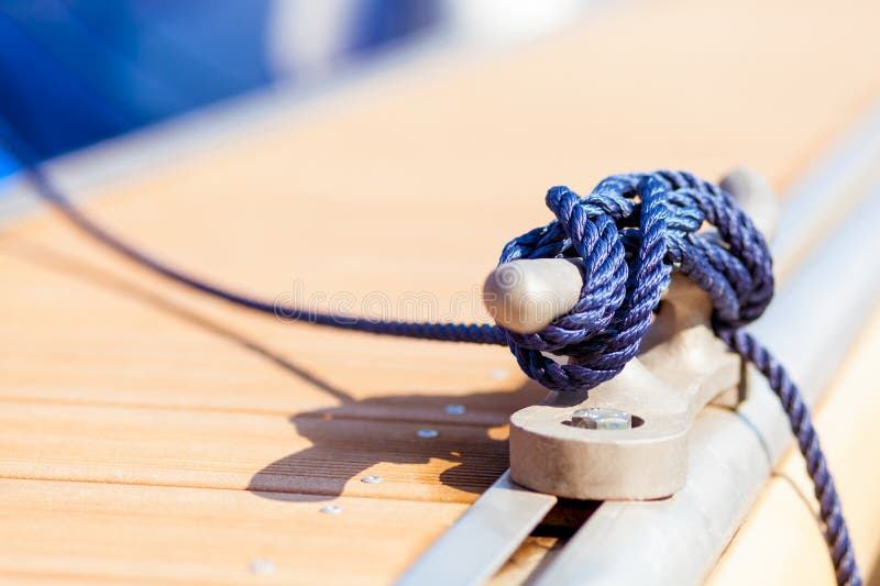 Blue mooring rope on ship