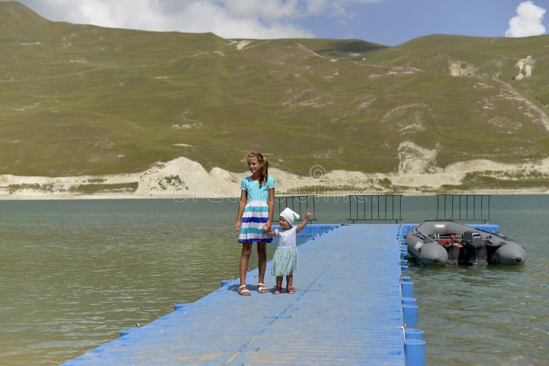 Blue mountain lake Kazenoi Am in the Chechen Republic on a Sunny summer day.