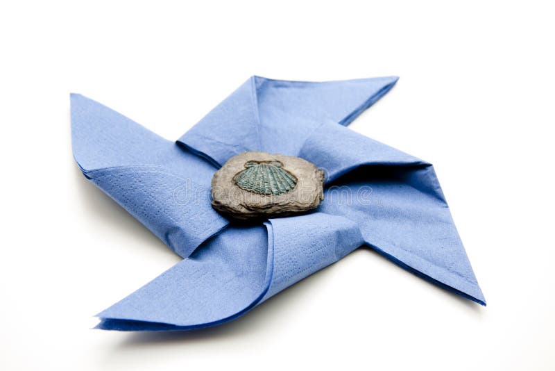 Blue napkin with stone