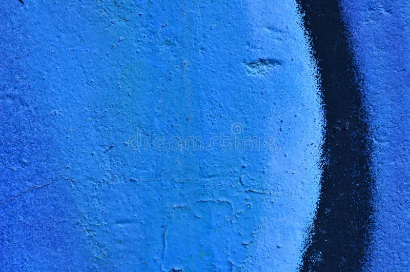 Blue Graffiti Paint Sprayed on Concrete Wall. Abstract Background Stock
