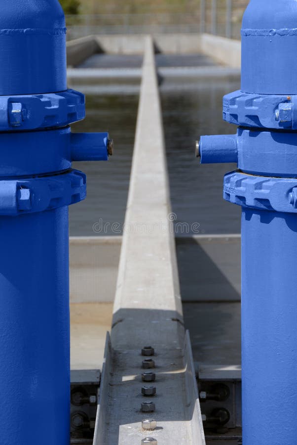 Fresh Water Pipes, Stainless Steel and Blue Painted, at Salmon Fish Hatchery in California. Fresh Water Pipes, Stainless Steel and Blue Painted, at Salmon Fish Hatchery in California